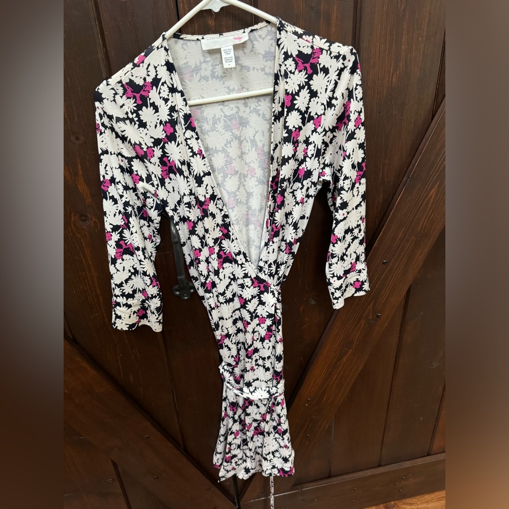 Diane von Furstenberg wrap dress. Navy, white and pink details. Size 6